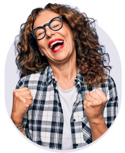 Woman in glasses smiling joyfully