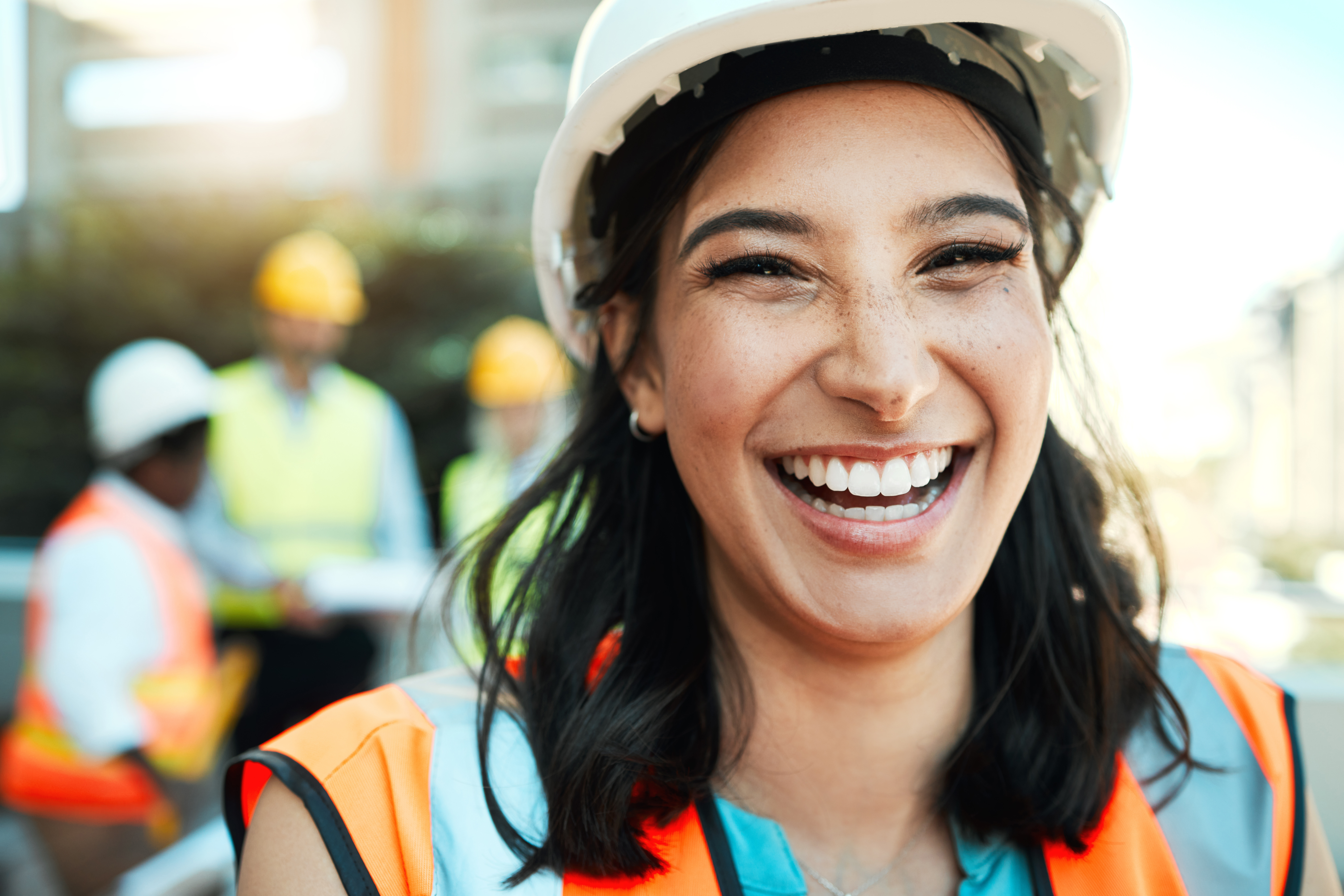 Woman construction worker smiling